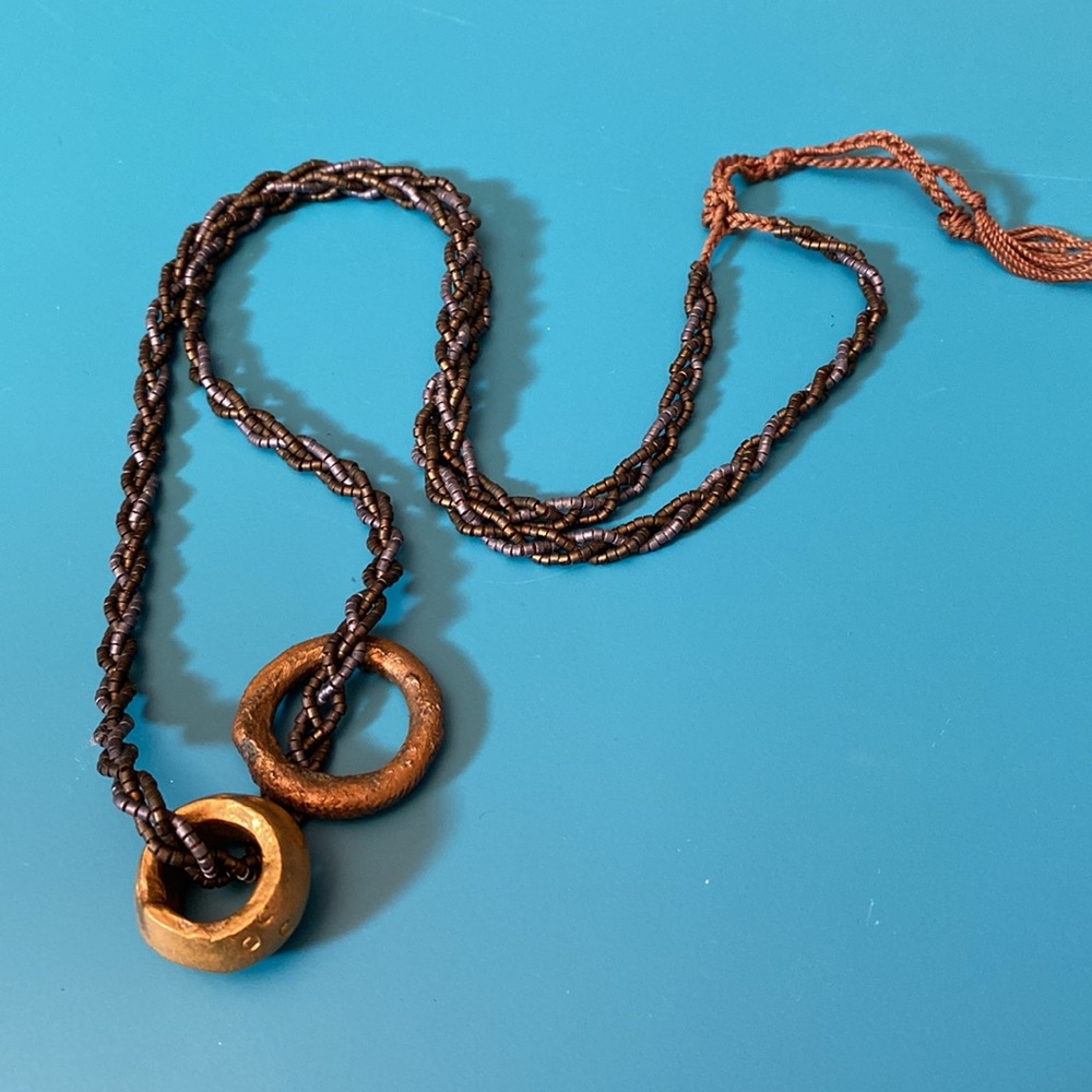 Bohemian beaded necklace with gold rings